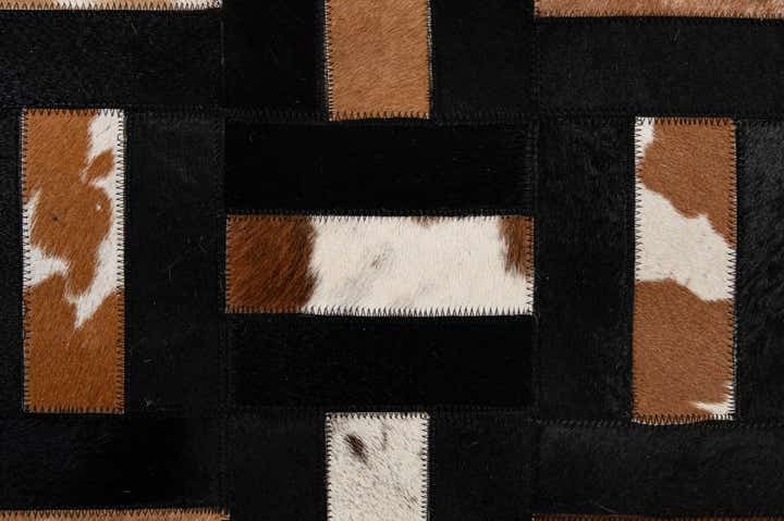 5' 3 x 8' 1 Cowhide - Patchwork Rug