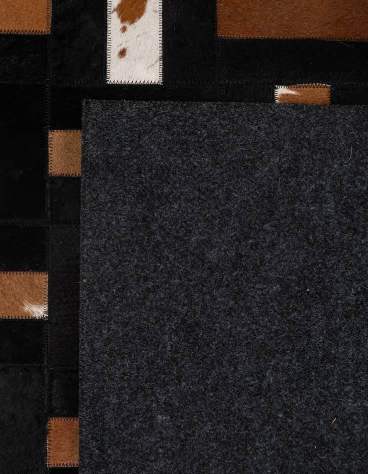 Detail image of 5' 3 x 8' 1 Cowhide - Patchwork Rug