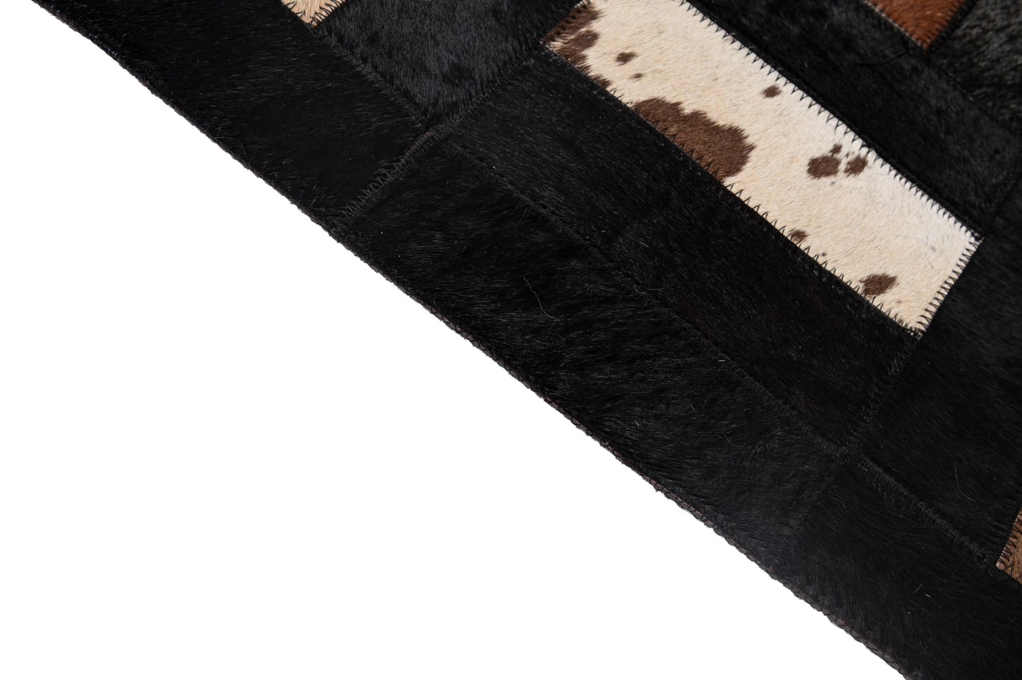 5' 3 x 8' 2 Cowhide - Patchwork Rug
