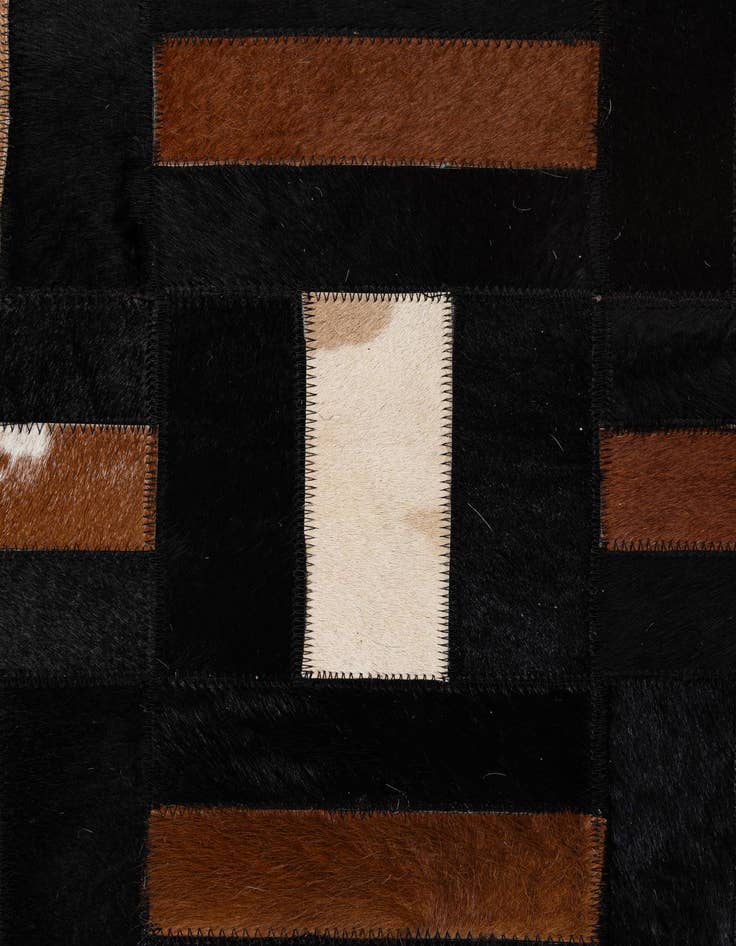 Detail image of 5' 3 x 8' 2 Cowhide - Patchwork Rug