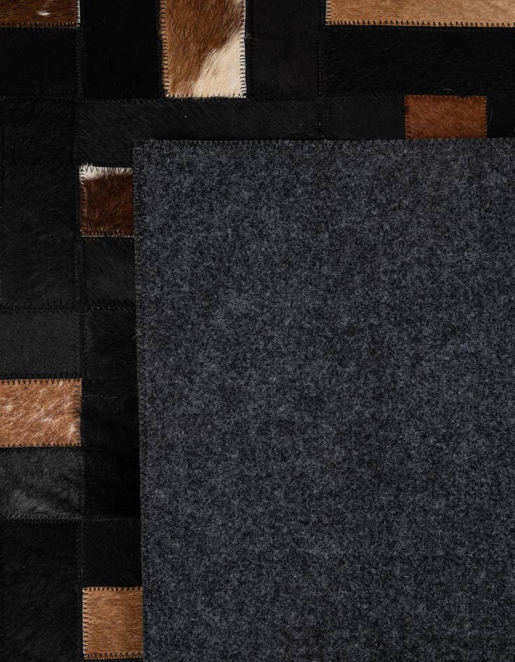 Detail image of 5' 3 x 8' 2 Cowhide - Patchwork Rug