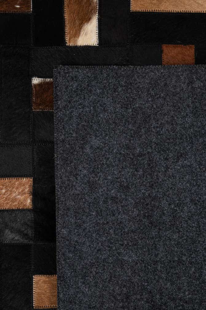 5' 3 x 8' 2 Cowhide - Patchwork Rug