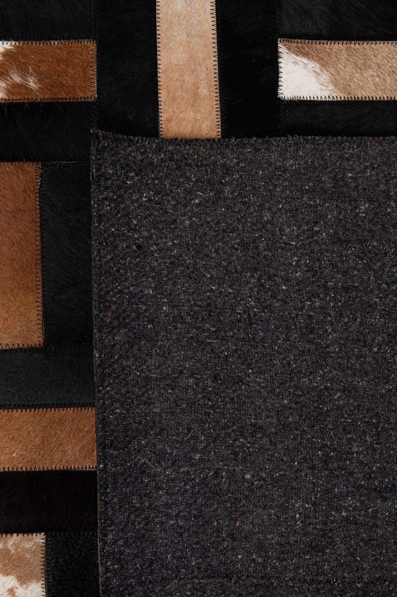 5' 3 x 8' 1 Cowhide - Patchwork Rug
