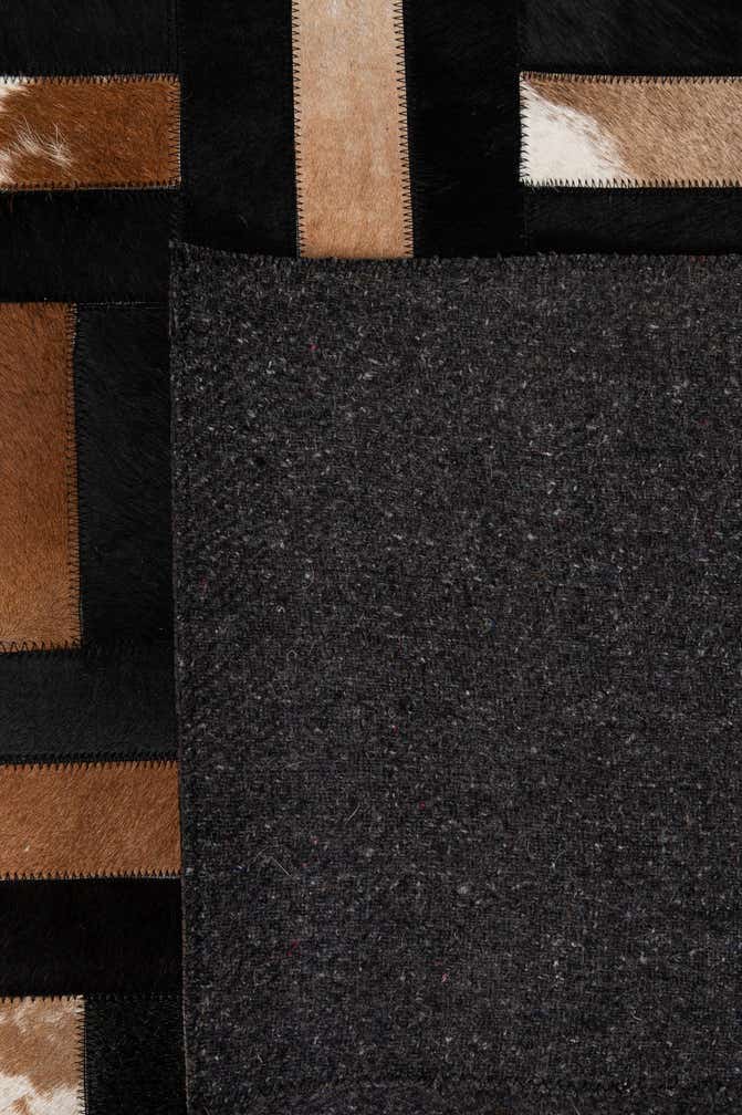 5' 3 x 8' 1 Cowhide - Patchwork Rug