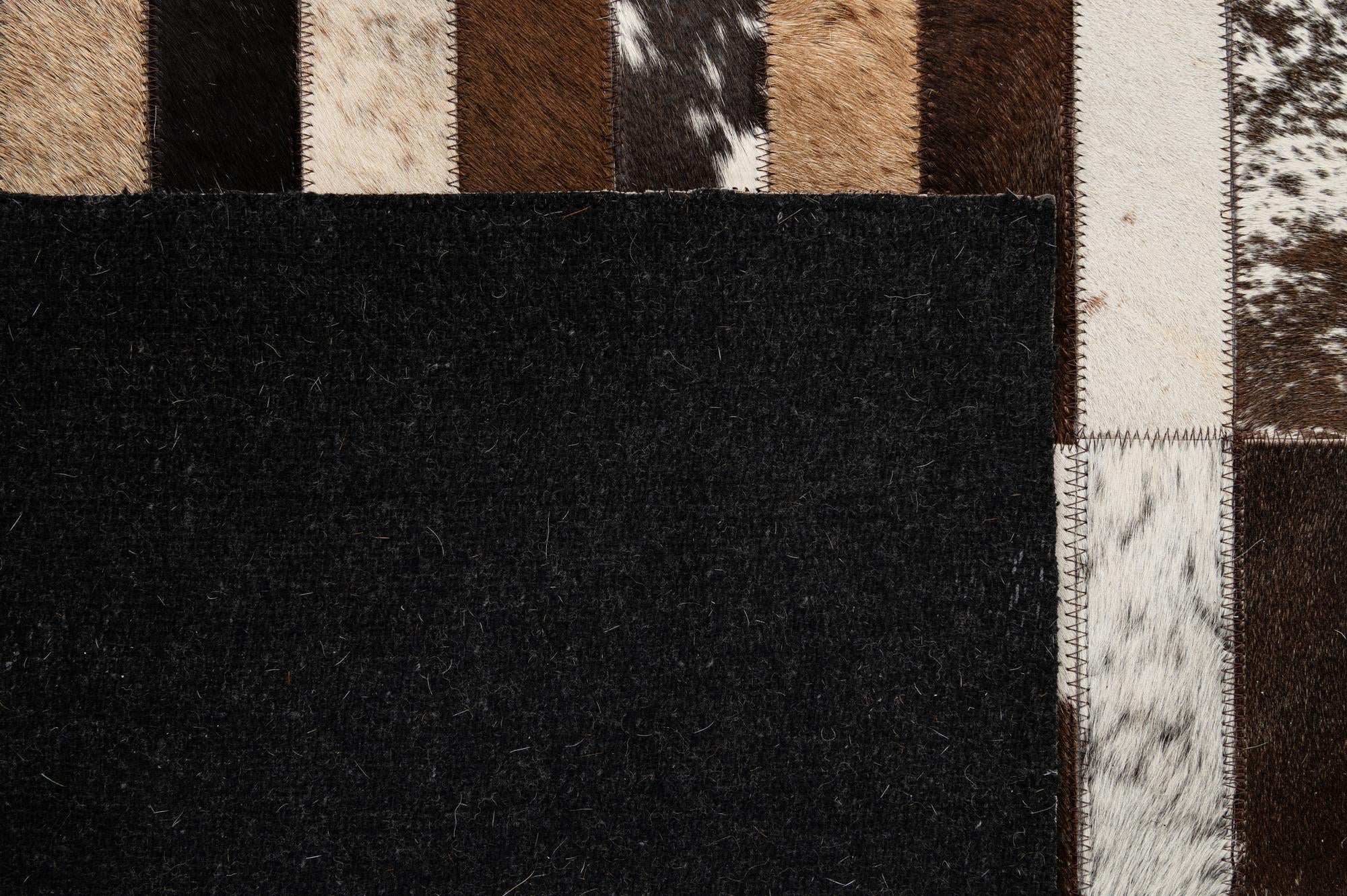 5' 3 x 8' 2 Cowhide - Patchwork Rug