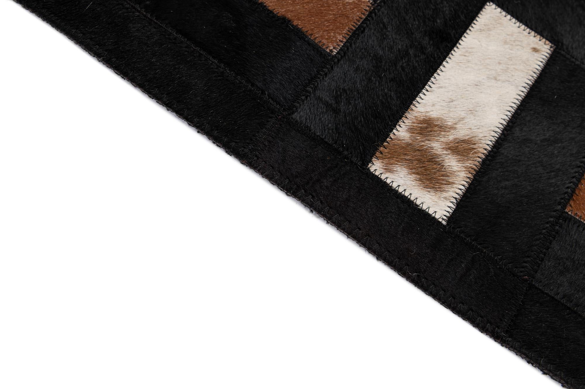 5' 2 x 8' 1 Cowhide - Patchwork Rug