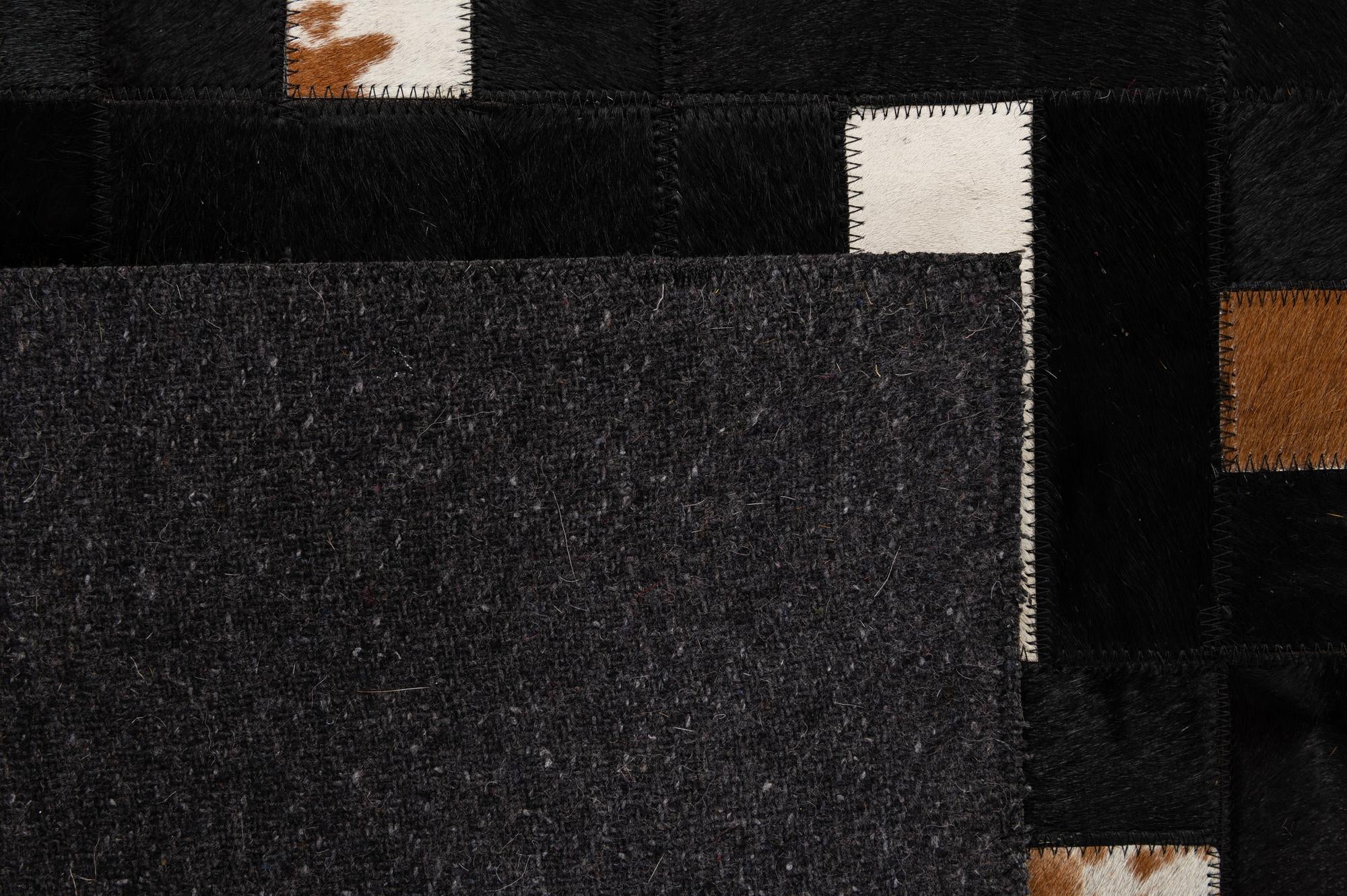 5' 2 x 8' 1 Cowhide - Patchwork Rug