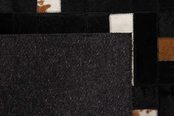 5' 2 x 8' 1 Cowhide - Patchwork Rug