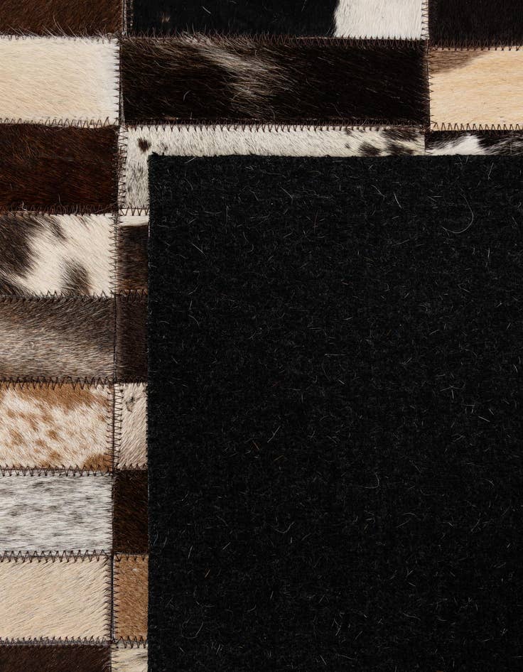 Detail image of 5' 3 x 7' 11 Cowhide - Patchwork Rug
