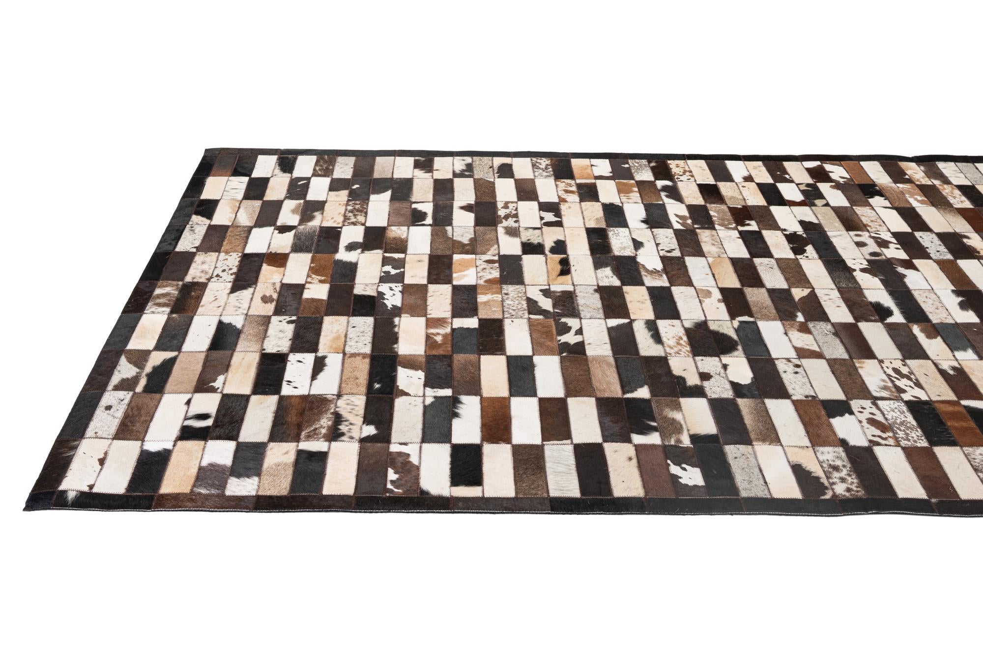 5' 3 x 8' 1 Cowhide - Patchwork Rug