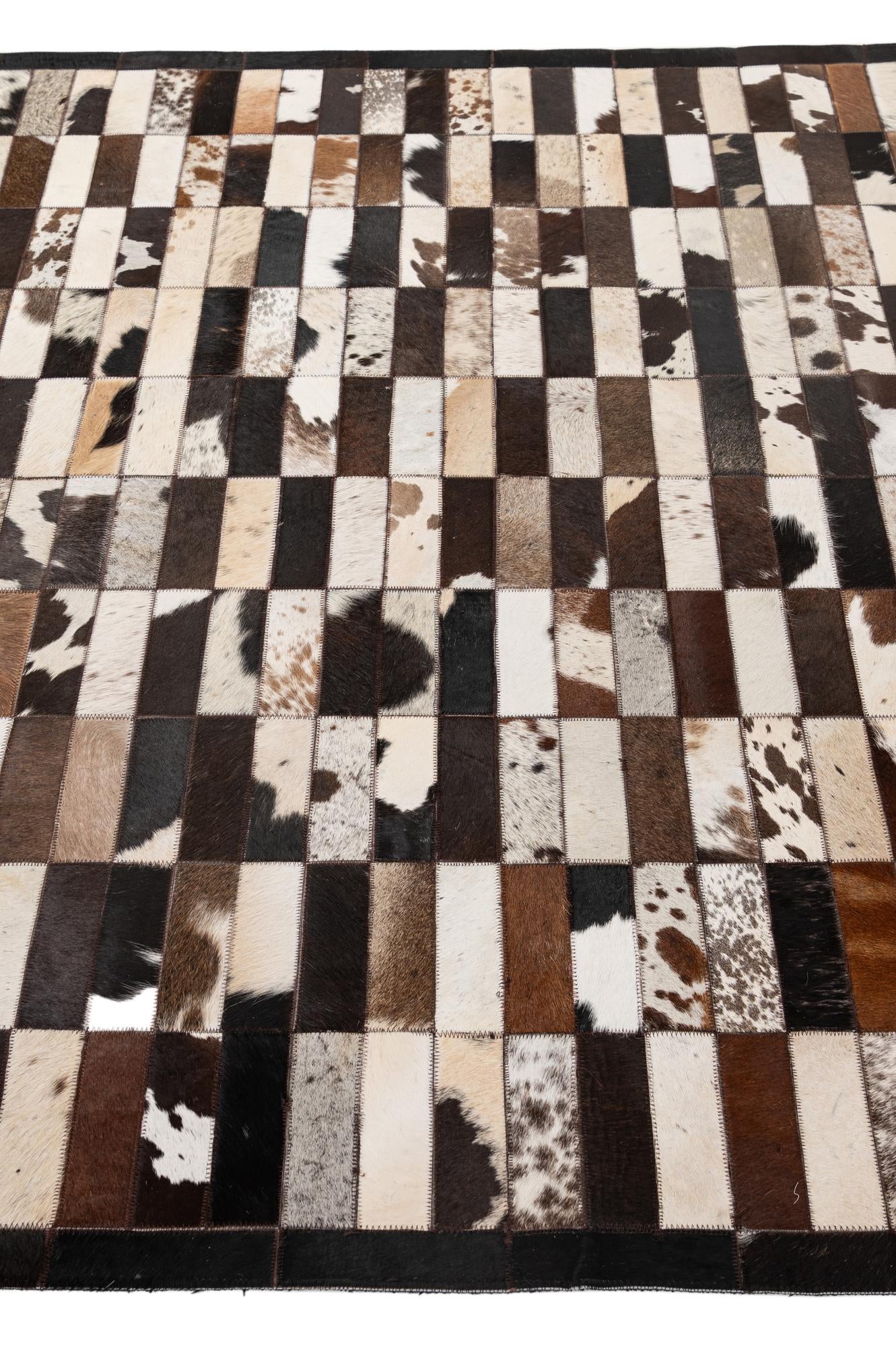 5' 3 x 8' 1 Cowhide - Patchwork Rug