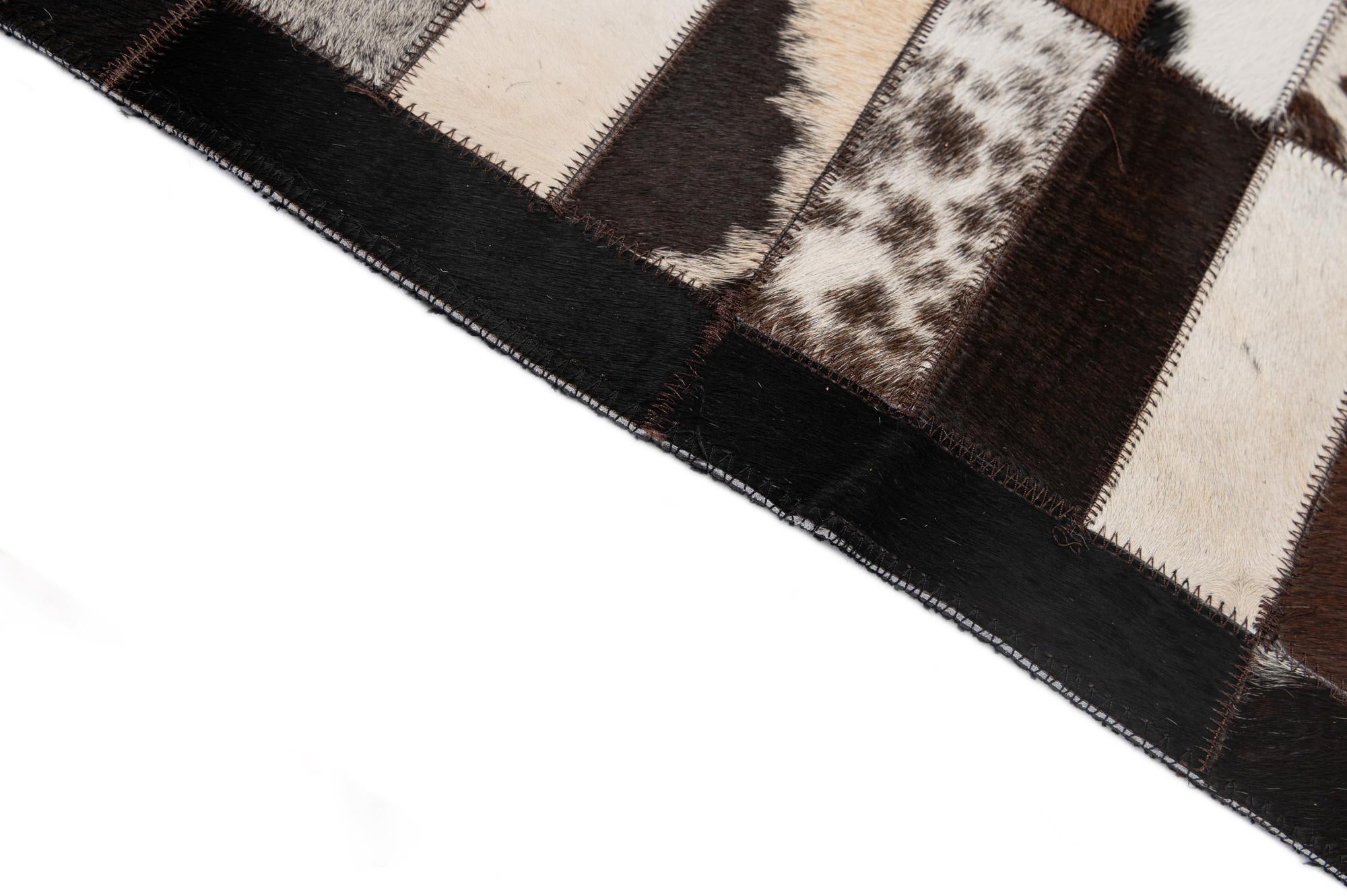 5' 3 x 8' 1 Cowhide - Patchwork Rug