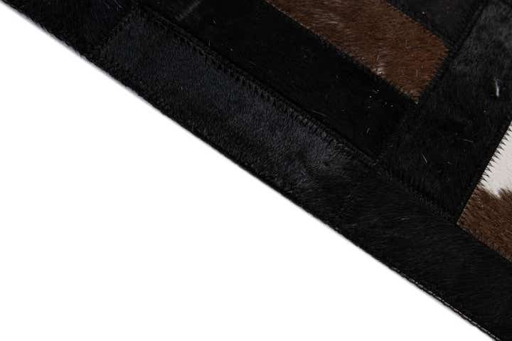 5' 2 x 8' 1 Cowhide - Patchwork Rug