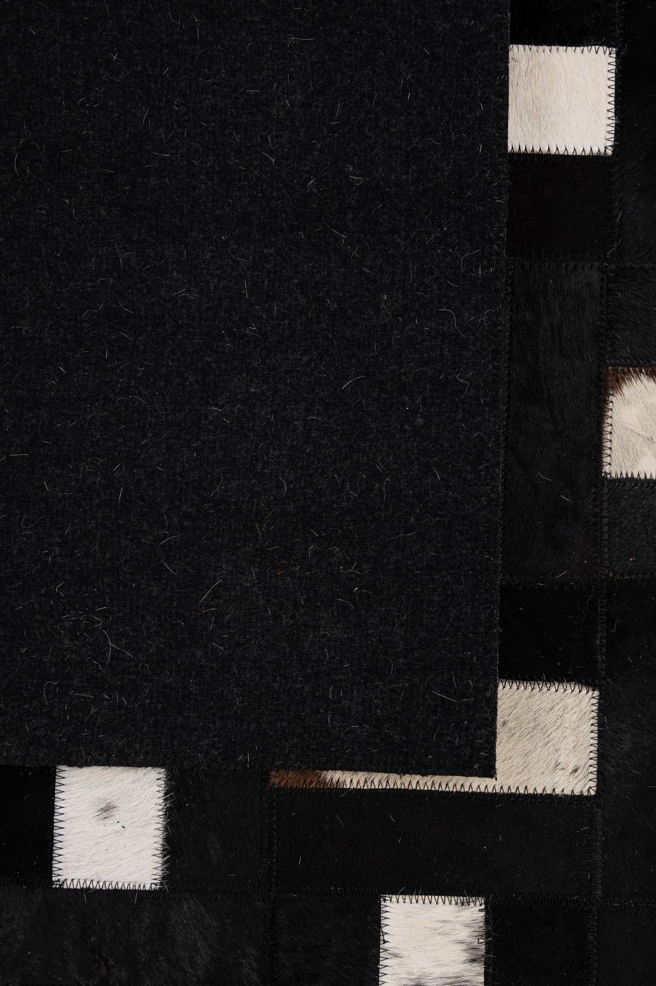 5' 2 x 8' 1 Cowhide - Patchwork Rug