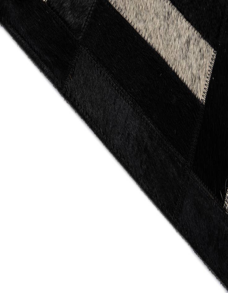 Detail image of 5' 3 x 8' 2 Cowhide - Patchwork Rug