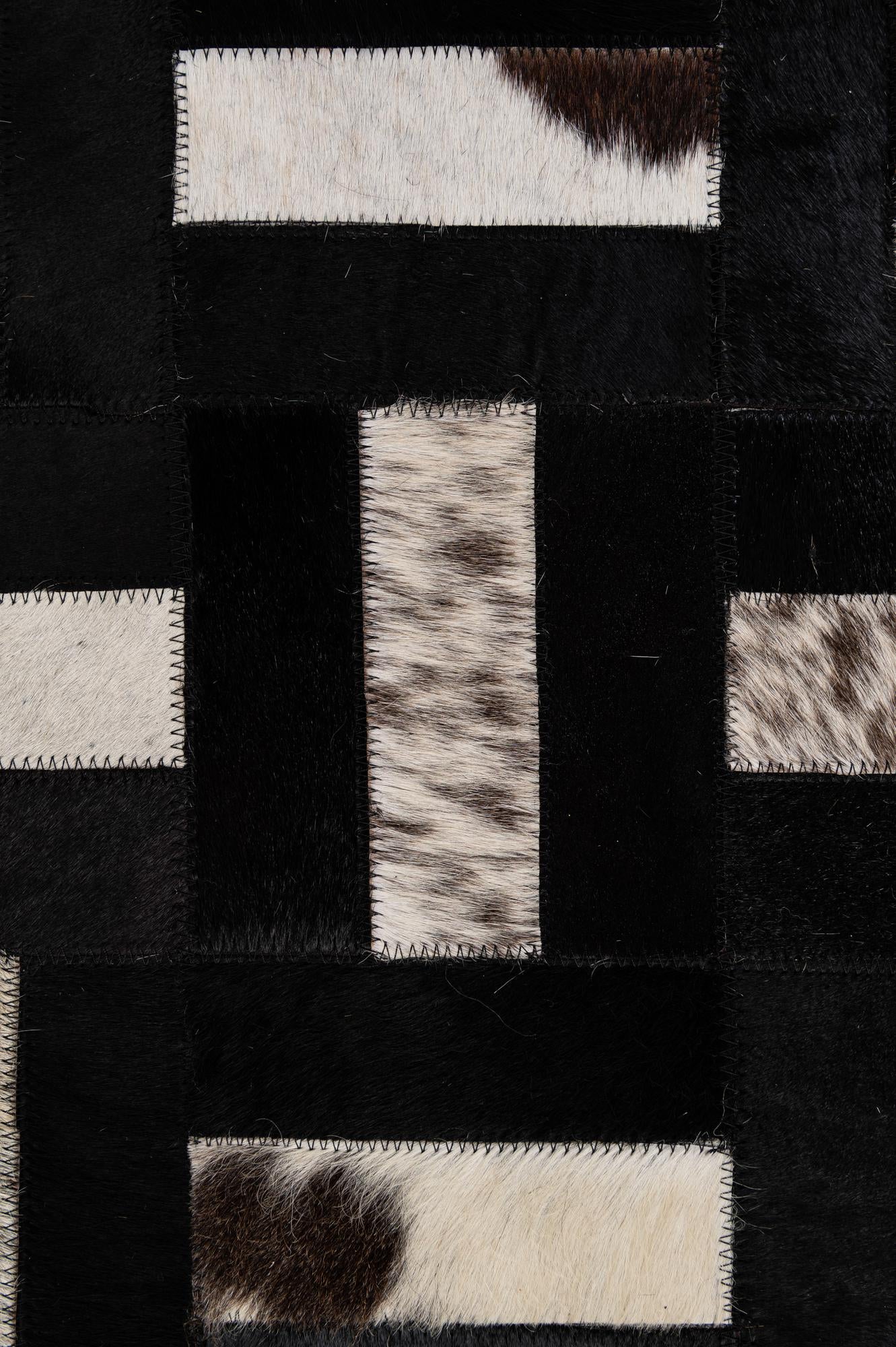 5' 3 x 8' 2 Cowhide - Patchwork Rug