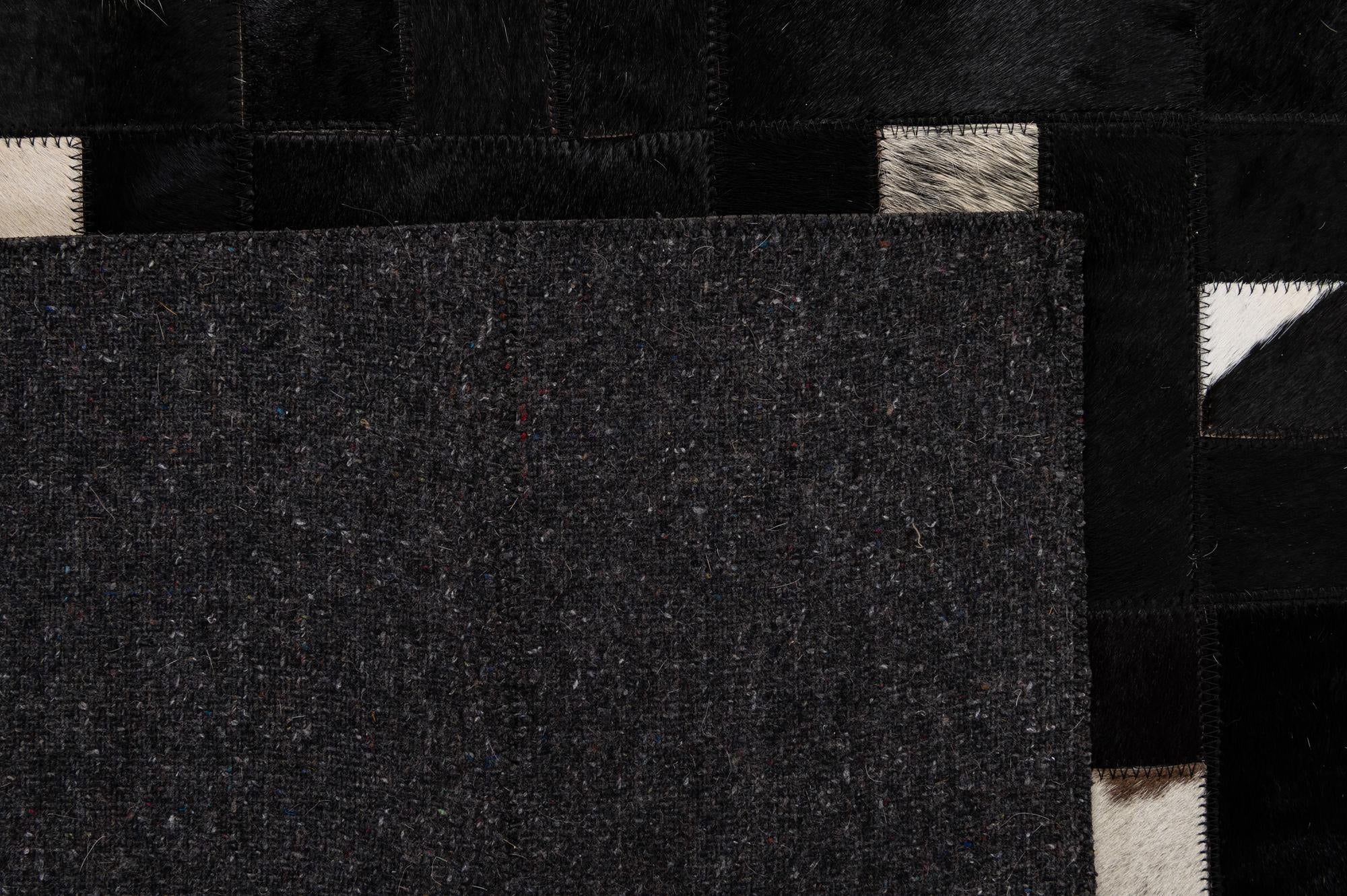 5' 3 x 8' 2 Cowhide - Patchwork Rug