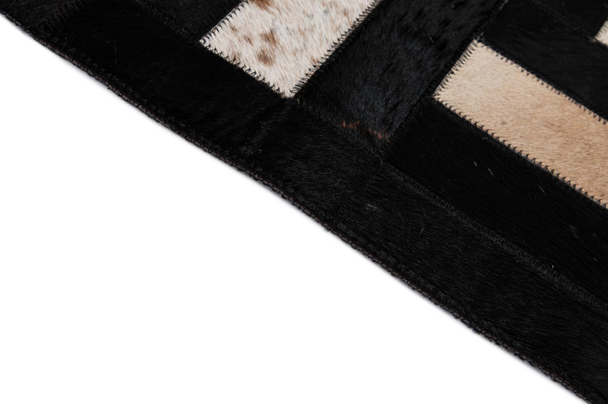 5' 3 x 8' 1 Cowhide - Patchwork Rug