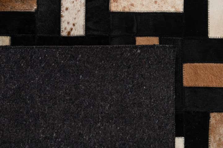 5' 3 x 8' 1 Cowhide - Patchwork Rug