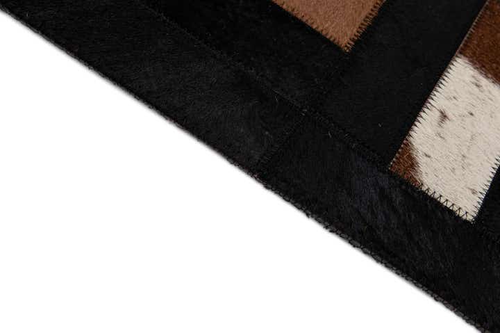 5' 3 x 8' 1 Cowhide - Patchwork Rug