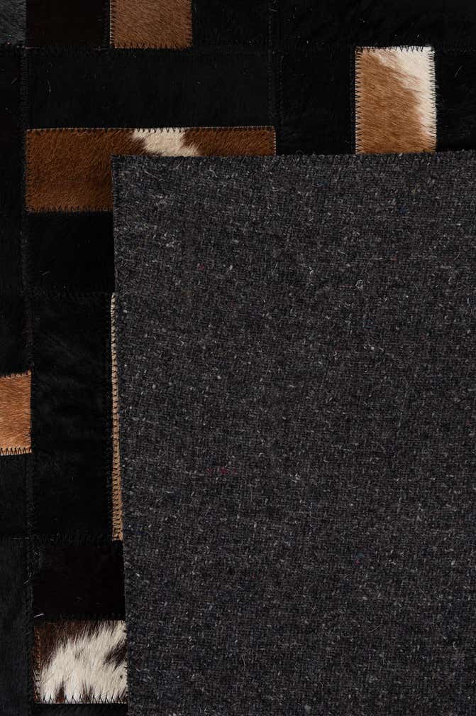 5' 3 x 8' 1 Cowhide - Patchwork Rug