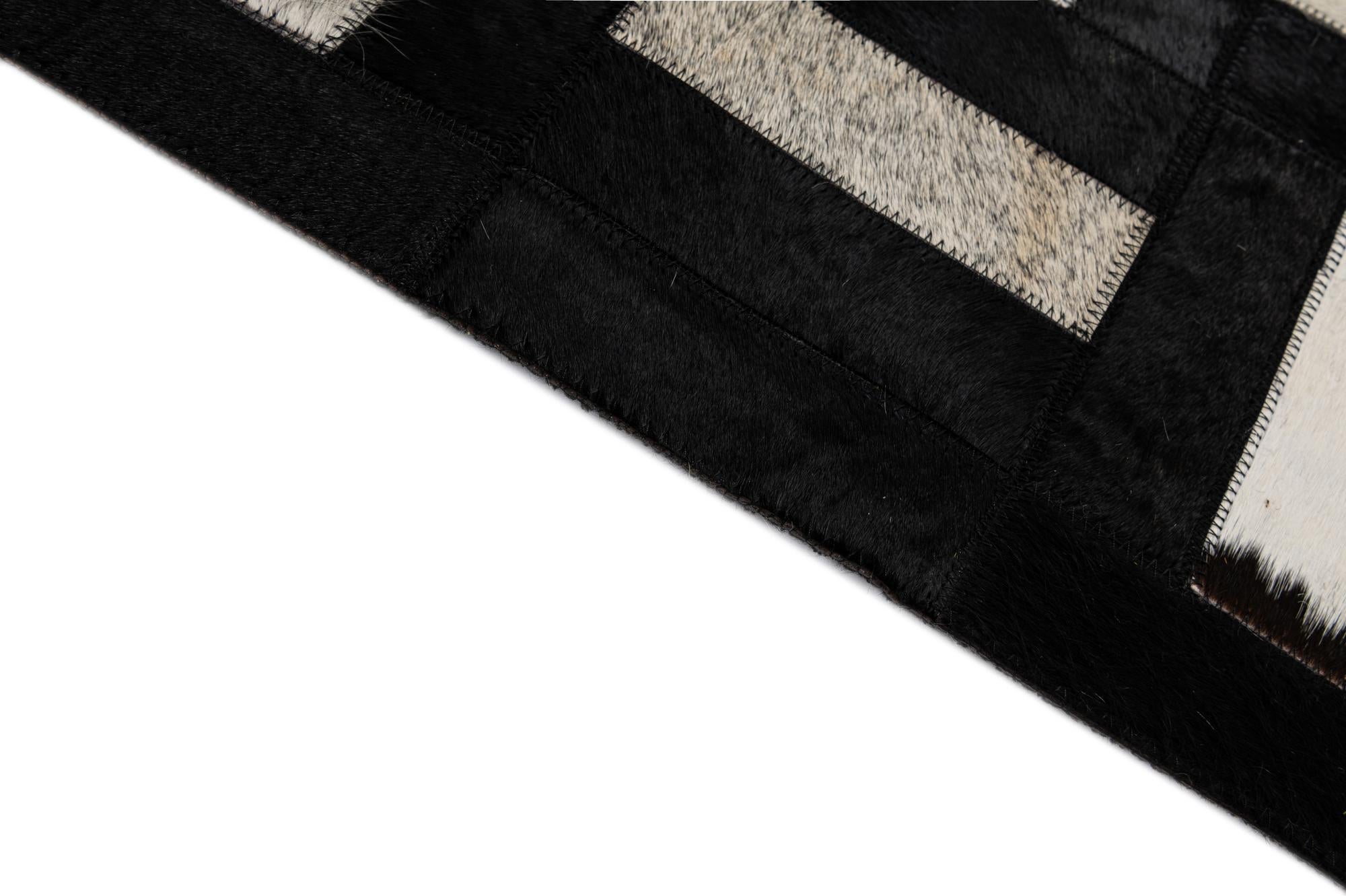 5' 3 x 8' 1 Cowhide - Patchwork Rug