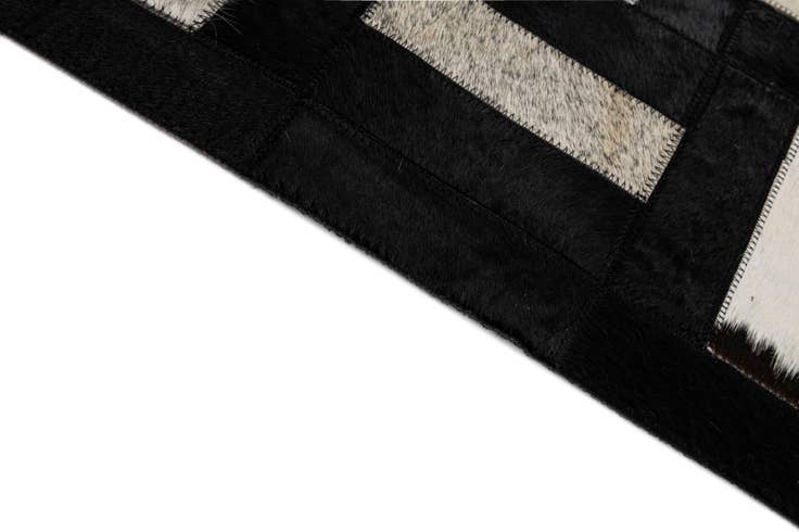 Detail image of 5' 3 x 8' 1 Cowhide - Patchwork Rug