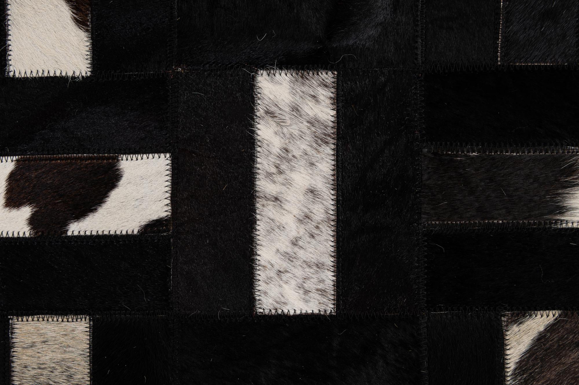 5' 3 x 8' 1 Cowhide - Patchwork Rug