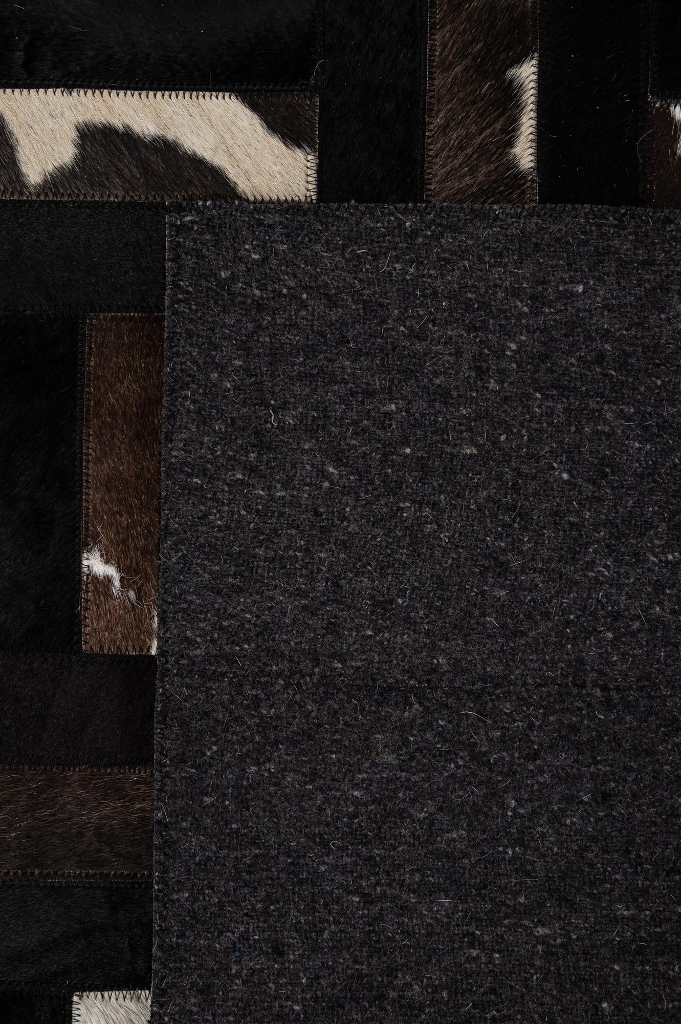 5' 3 x 8' 1 Cowhide - Patchwork Rug
