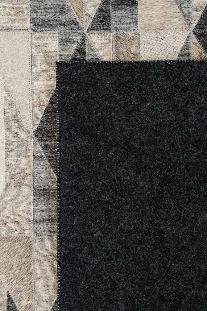 5' 2 x 7' 8 Cowhide - Patchwork Rug