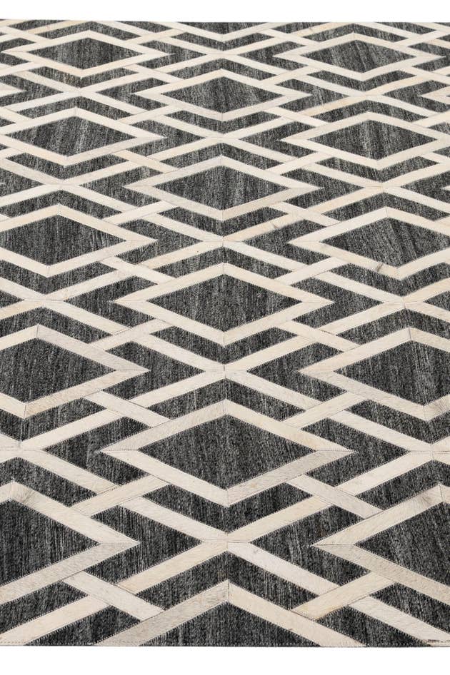 Detail image of 5' 1 x 7' 11 Cowhide - Patchwork Rug