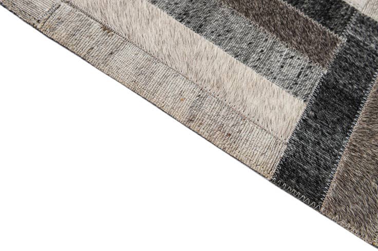 Detail image of 5' 3 x 7' 5 Cowhide - Patchwork Rug