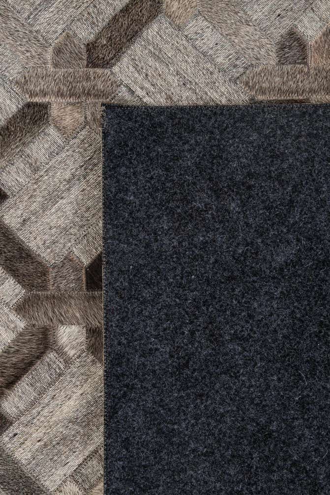5' 3 x 8' 1 Cowhide - Patchwork Rug