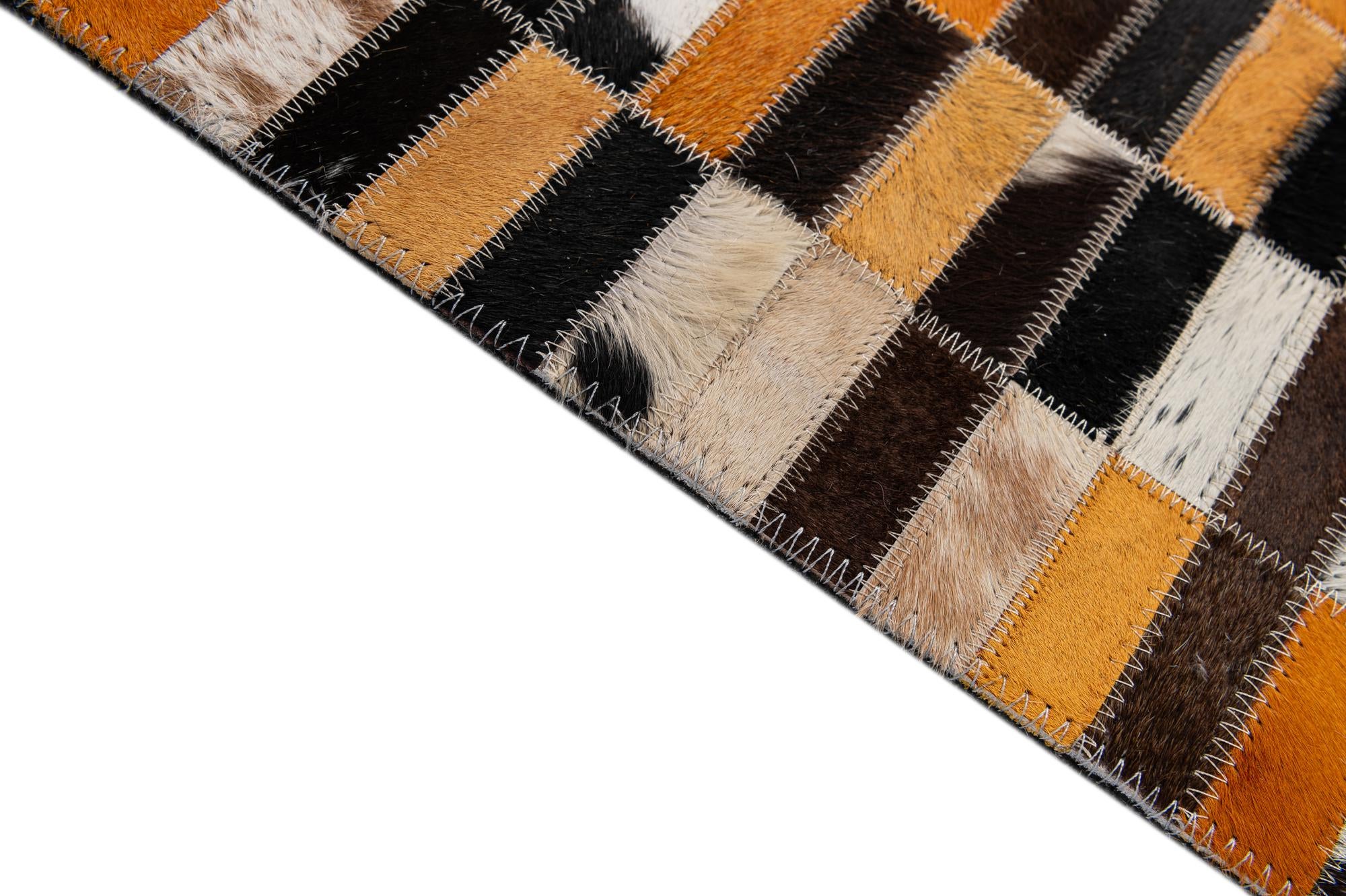 4' 11 x 7' 10 Cowhide - Patchwork Rug