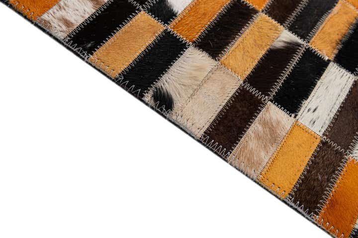 4' 11 x 7' 10 Cowhide - Patchwork Rug