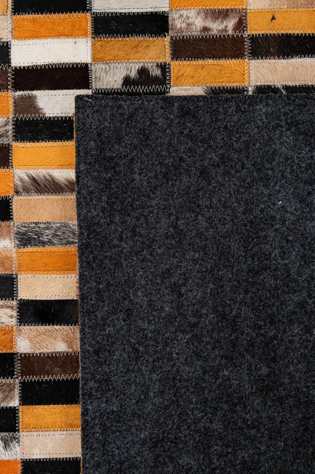 4' 11 x 7' 10 Cowhide - Patchwork Rug