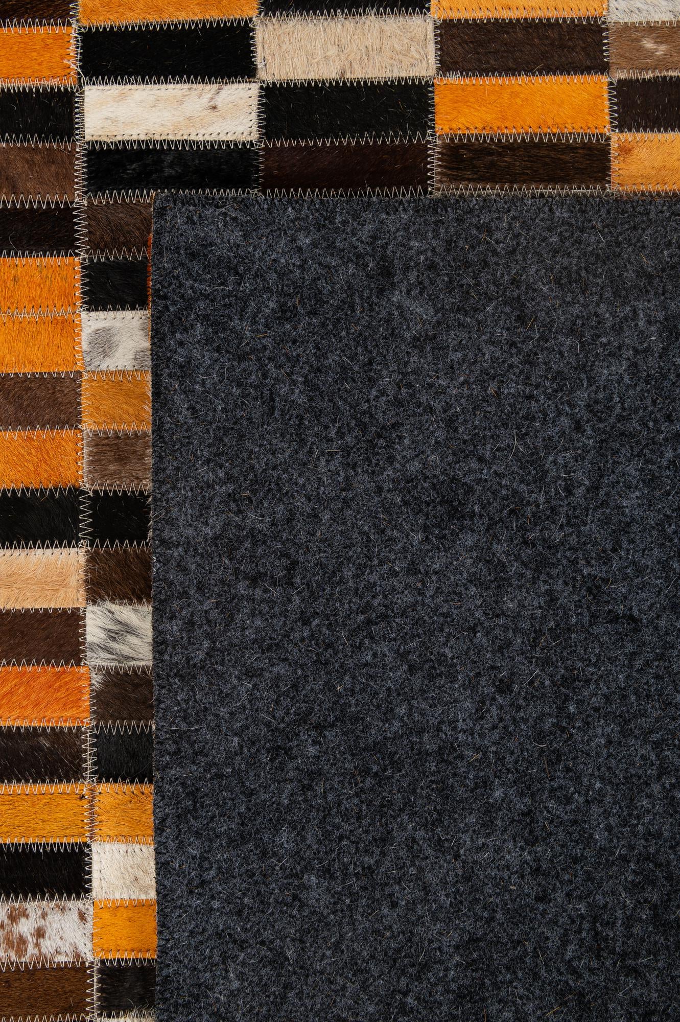 4' 11 x 7' 9 Cowhide - Patchwork Rug