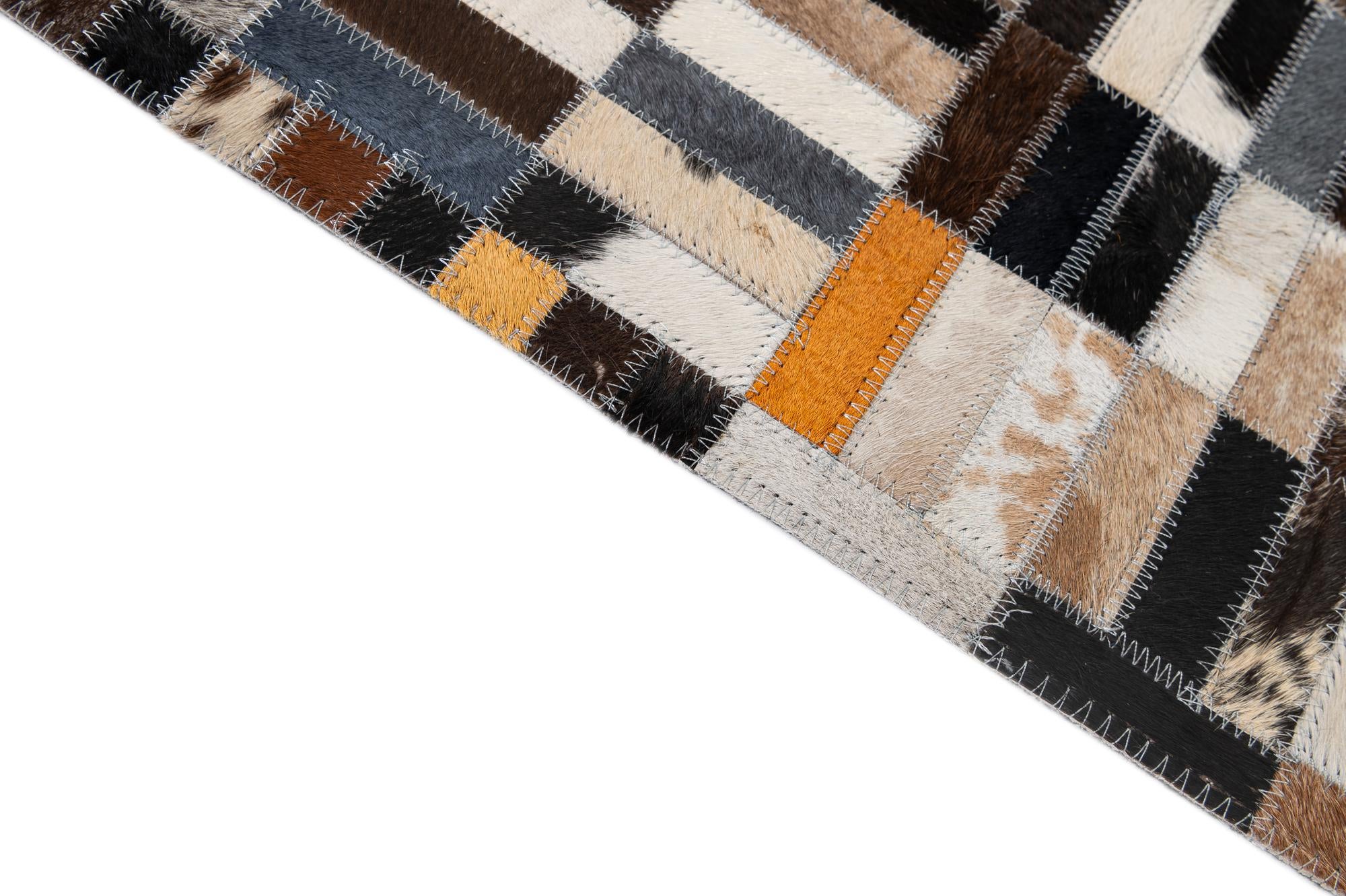 5' 1 x 7' Cowhide - Patchwork Rug