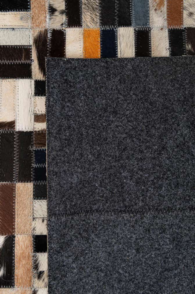 5' 1 x 7' Cowhide - Patchwork Rug