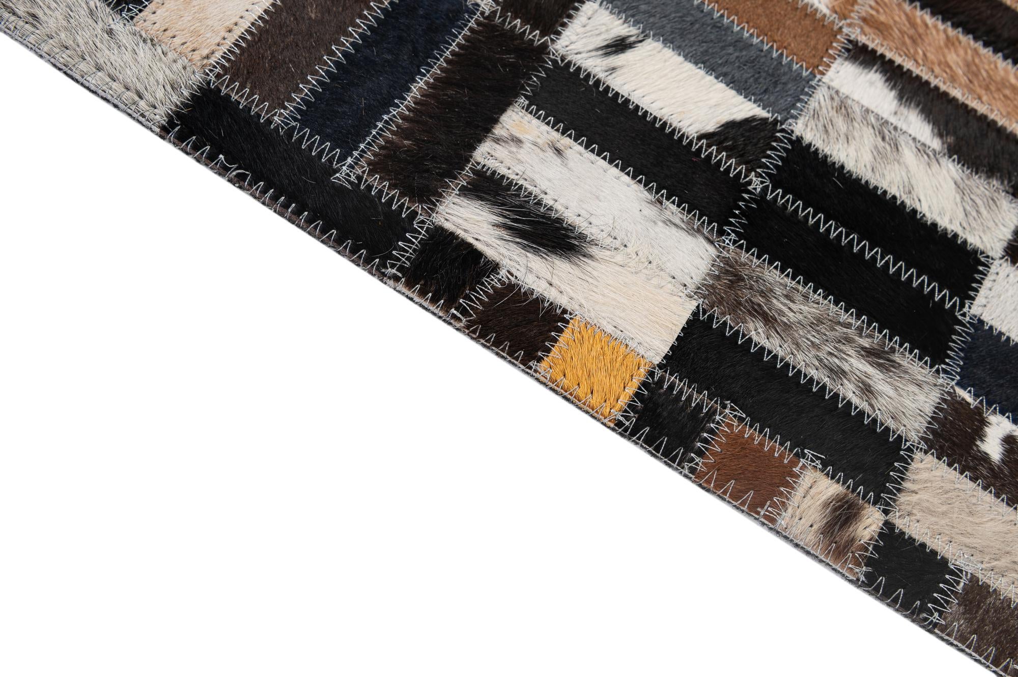 5' 1 x 8' 2 Cowhide - Patchwork Rug