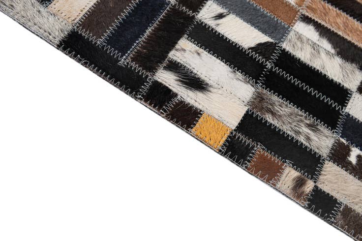 Detail image of 5' 1 x 8' 2 Cowhide - Patchwork Rug