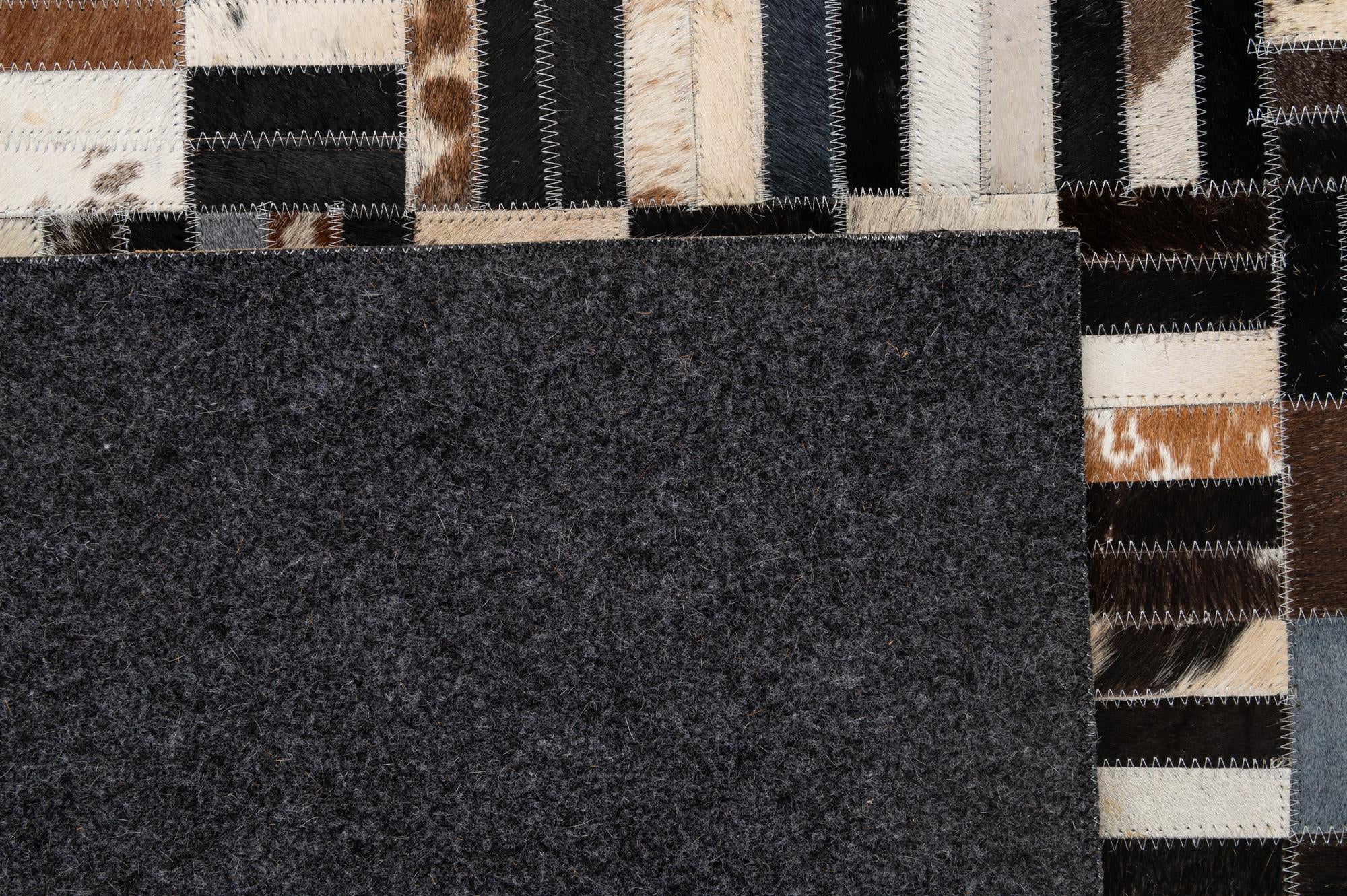 5' 1 x 8' 2 Cowhide - Patchwork Rug