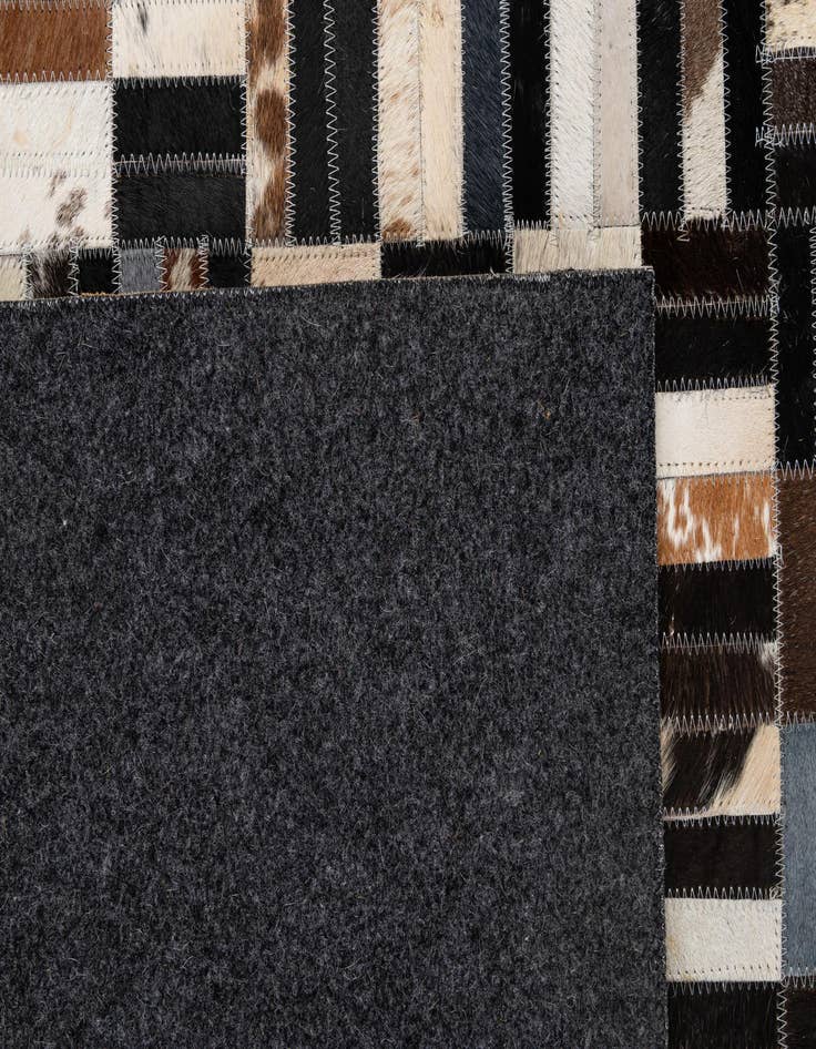 Detail image of 5' 1 x 8' 2 Cowhide - Patchwork Rug