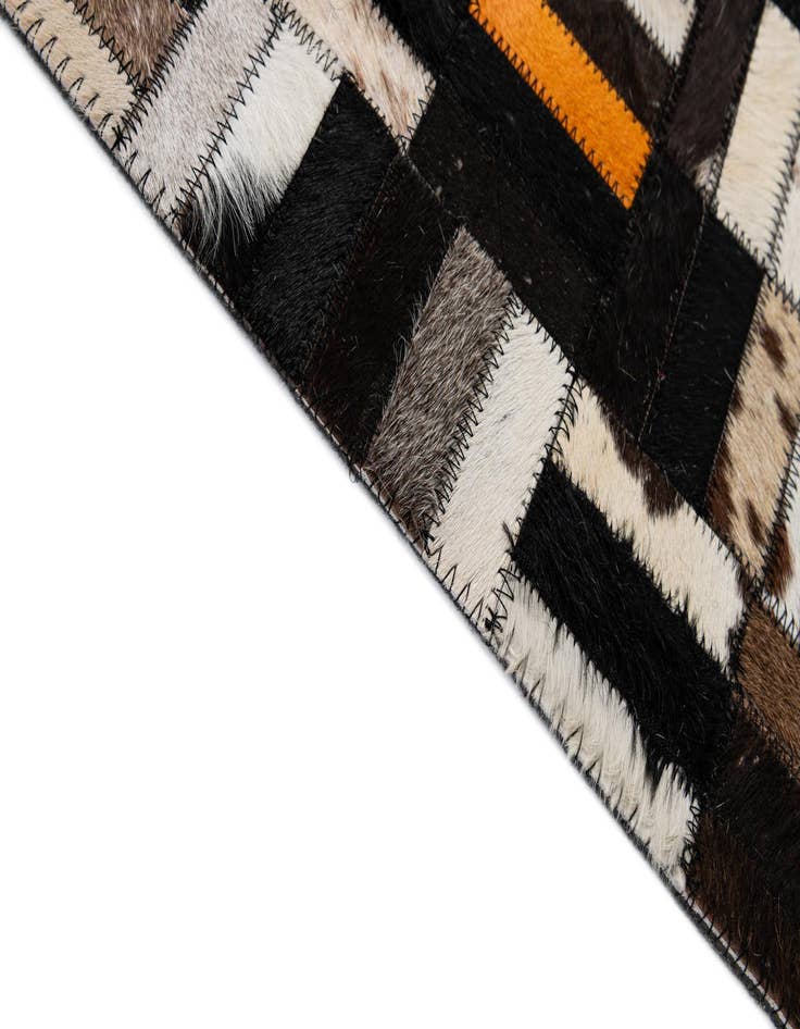 Detail image of 5' 1 x 8' 1 Cowhide - Patchwork Rug