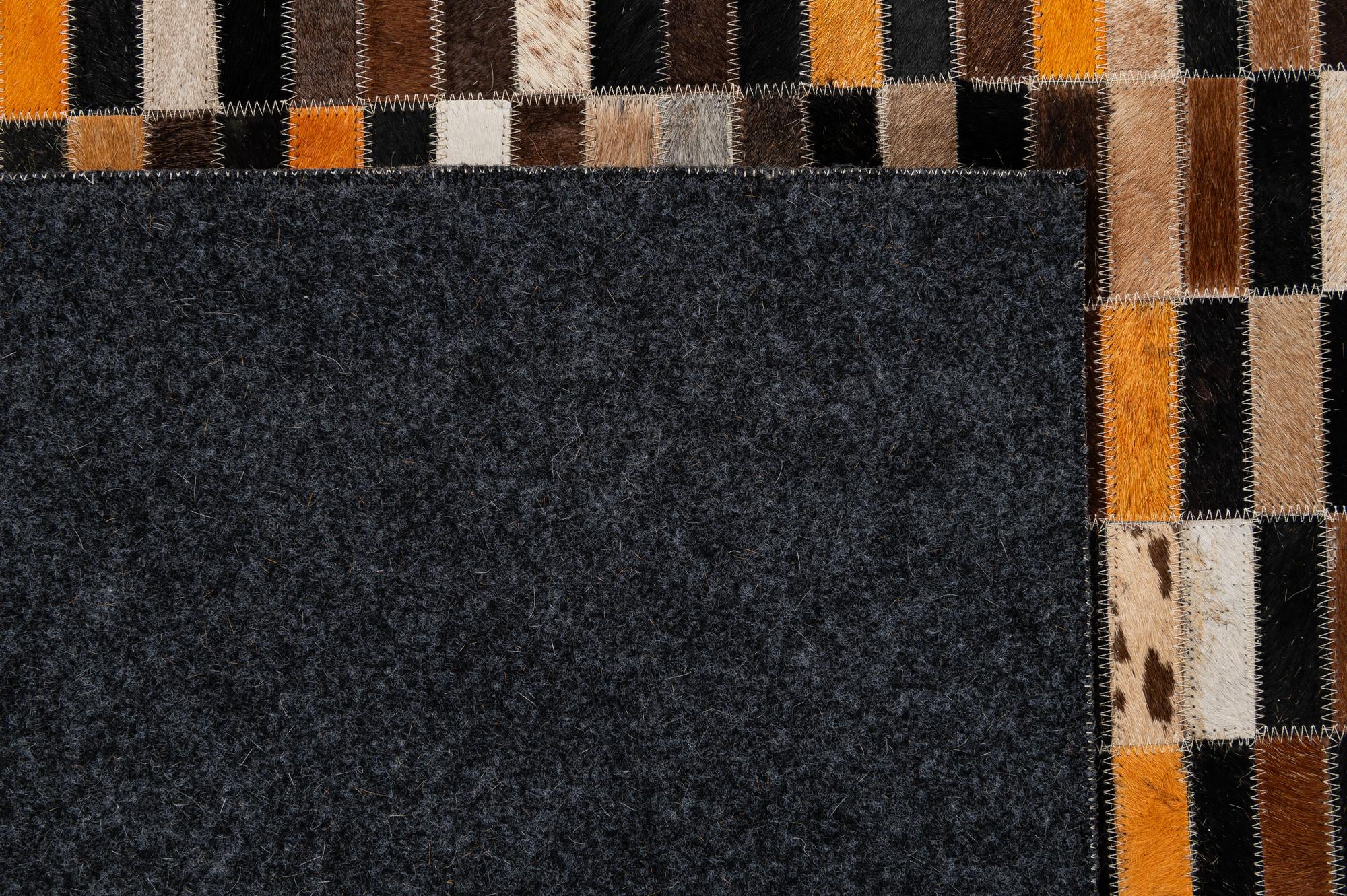 5' 2 x 8' 1 Cowhide - Patchwork Rug