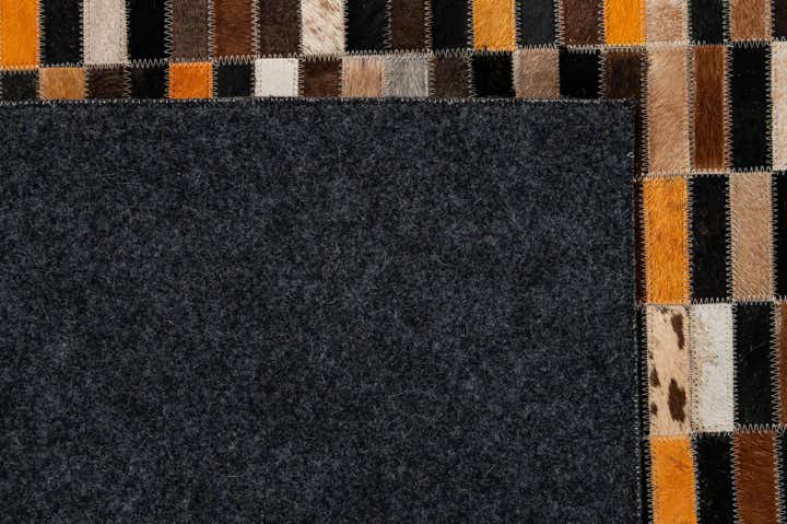 5' 2 x 8' 1 Cowhide - Patchwork Rug