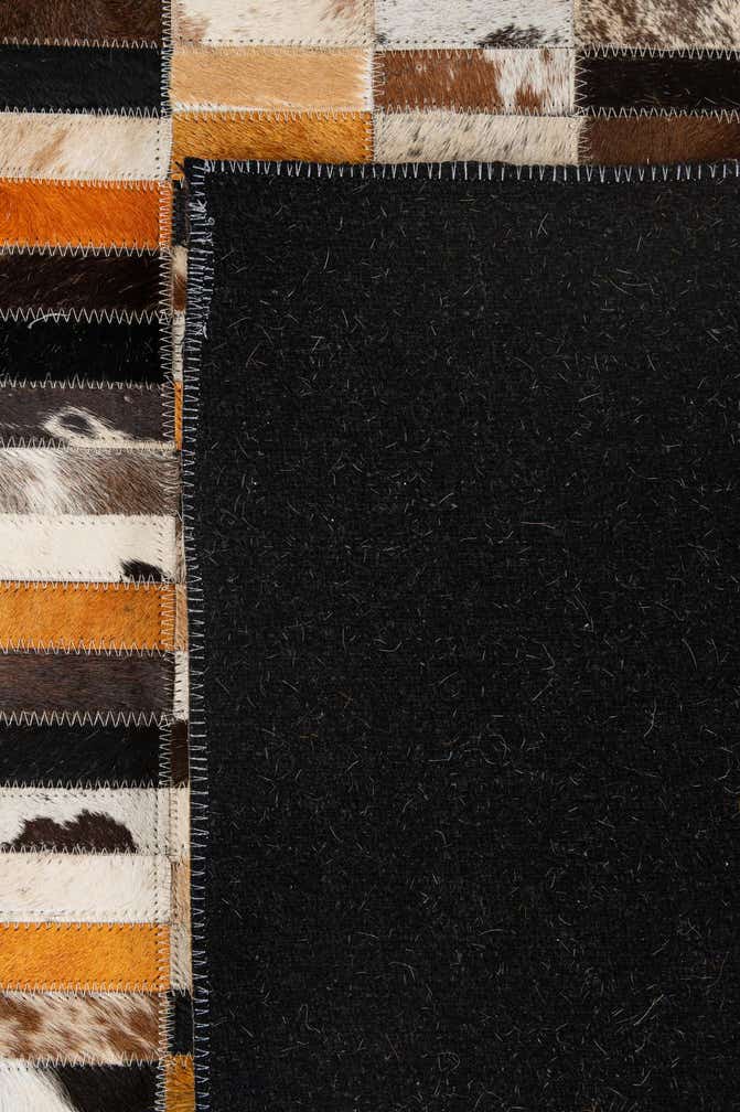 5' 1 x 7' 11 Cowhide - Patchwork Rug