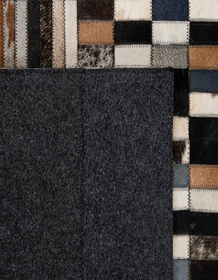 Detail image of 5' 1 x 8' Cowhide - Patchwork Rug