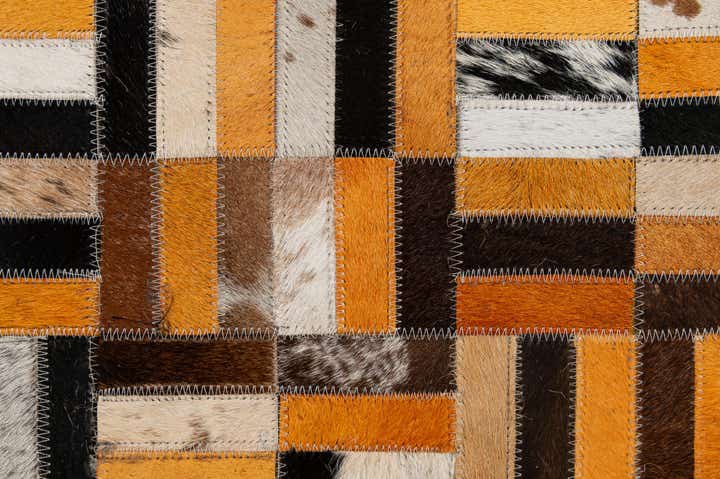 4' 11 x 7' 10 Cowhide - Patchwork Rug