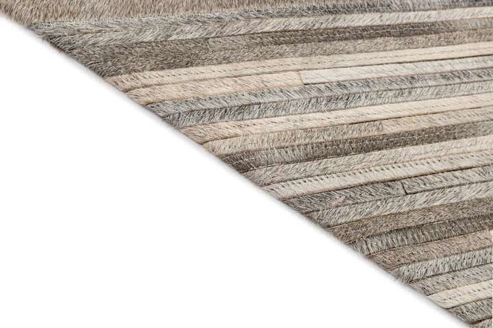 5' 6 x 9' 7 Cowhide - Patchwork Rug